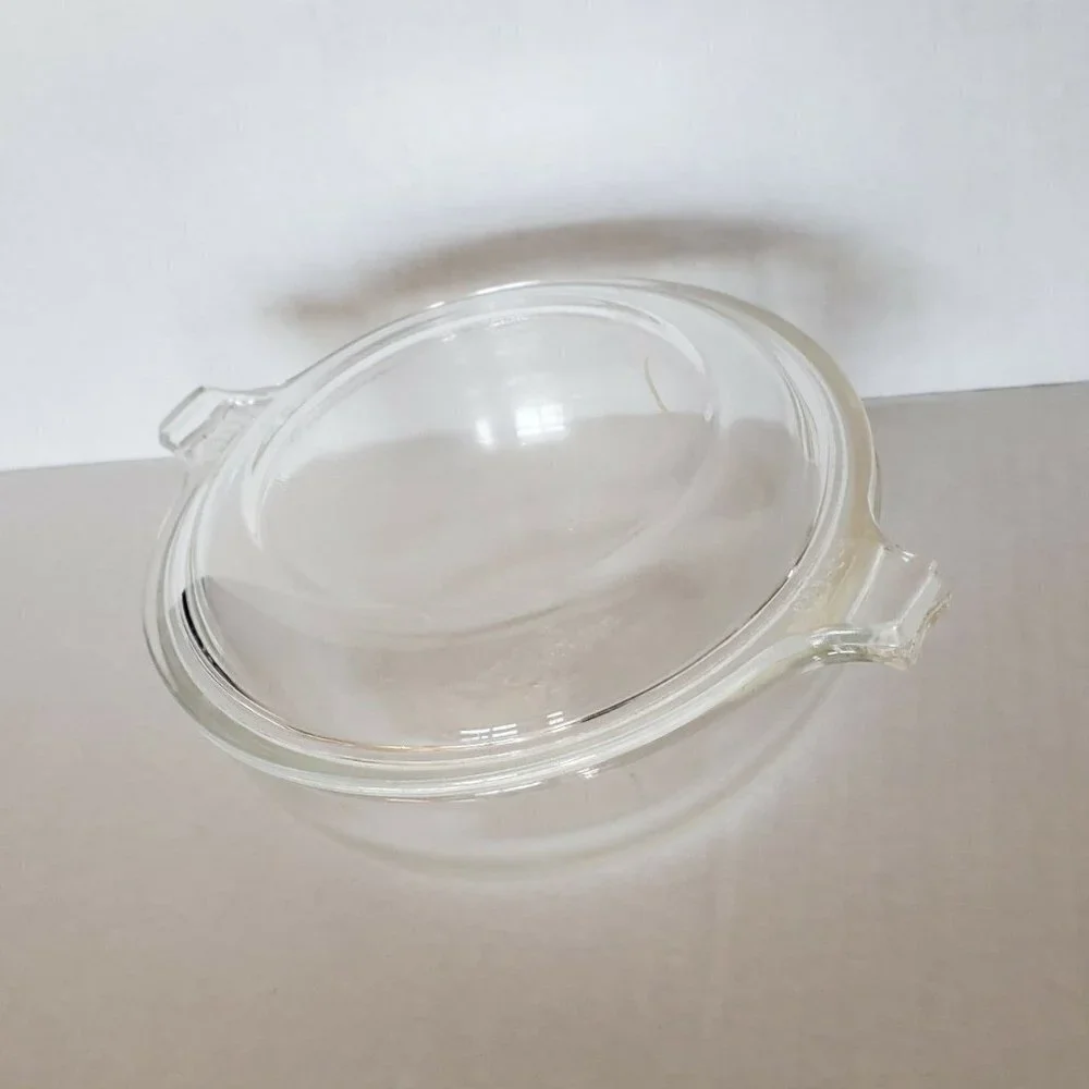 Pyrex small glass Cinderella bowl with lid handles